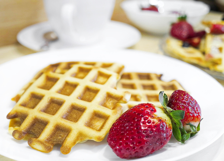 Viennese waffles. Home-made waffle baking. Waffles with berriesの写真素材