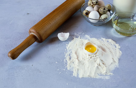 Baking Cooking Ingredients Flour Eggs Rolling Pin Butter And Kitchen Textileの写真素材