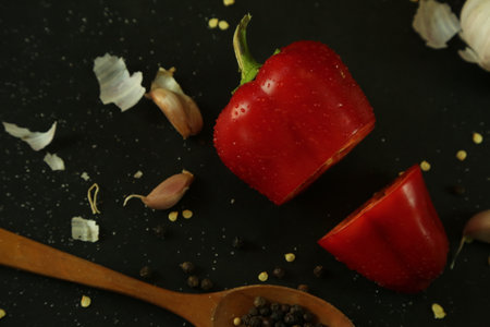 Red peppers on black backgroundの写真素材