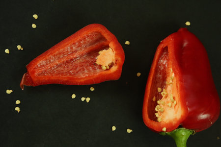 Red peppers on black backgroundの写真素材