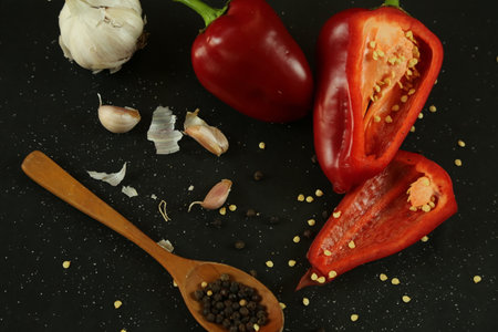 Red peppers on black backgroundの写真素材