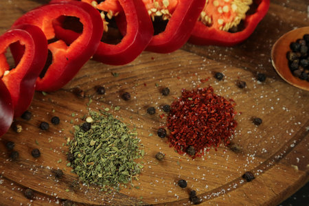 Red peppers on black background