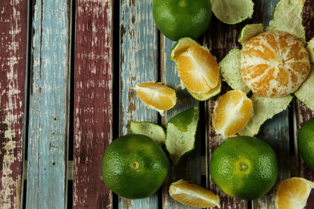 Green sweet tangerines growing with backgroundの写真素材