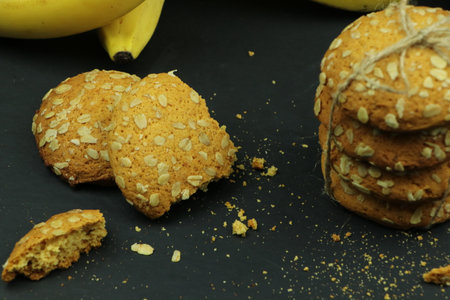 round ginger biscuit with crumbsの写真素材