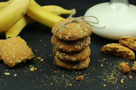 round ginger biscuit with crumbsの写真素材