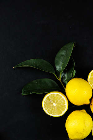 Group of lemons with leaves, isolated on backgroundの写真素材