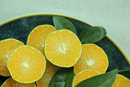 Green sweet tangerines growing with backgroundの写真素材