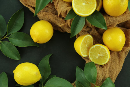 Group of lemons with leaves, isolated on backgroundの写真素材