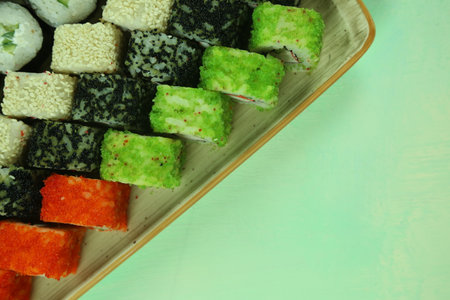 Various kinds of sushi served, close-up view