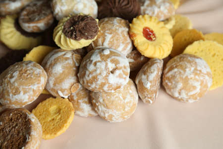 gingerbread sweets, airy cakes on background