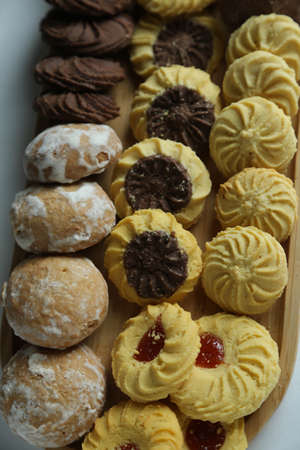 gingerbread sweets, airy cakes on background
