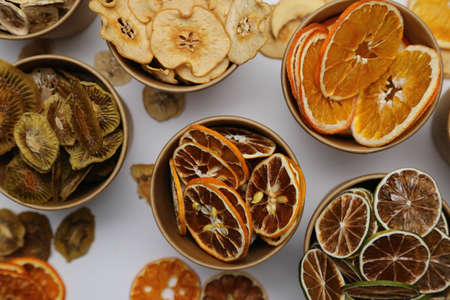 Dried fruit on colored background. Pattern of a fruit frips. Healthy eatingの写真素材