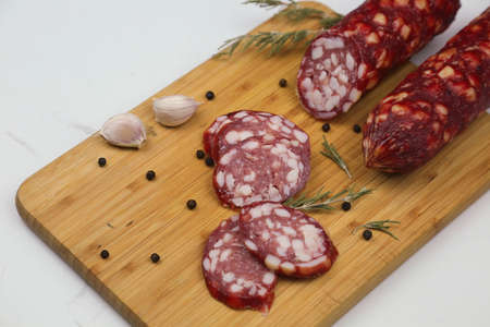 Smoked pork sausages, isolated on white background.の写真素材