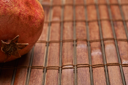 garnet on brown bamboo backgroundの写真素材