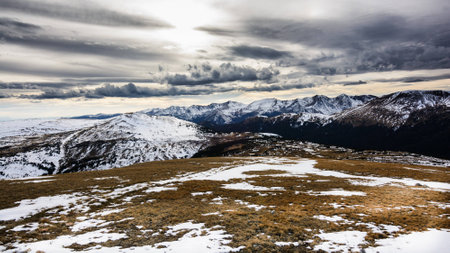 Snow on wind swept mountainsの写真素材