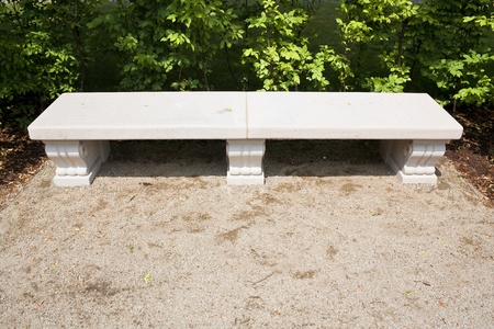 Marble lonely bench in luxury gardenの写真素材