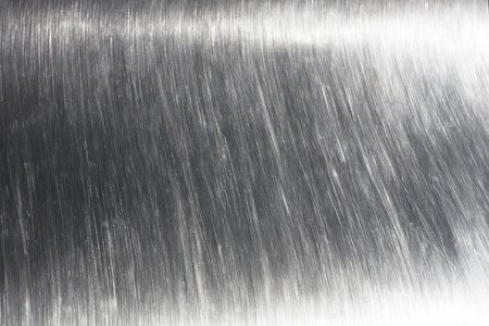 Brushed metal  plate. Shiny steel.の写真素材