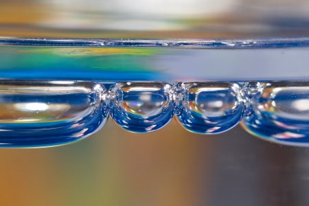 Colorful bubbles in clear water の写真素材