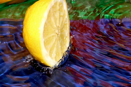 Splash with fresh lemon  の写真素材