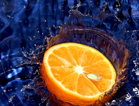 Splash with fresh lemon   Blue background の写真素材