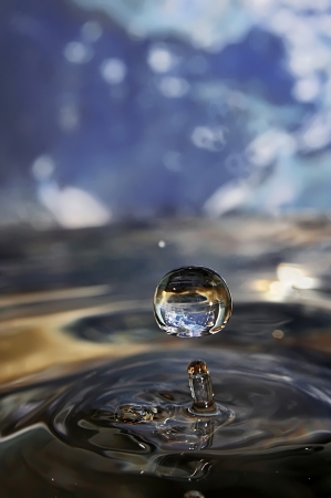 Earth in drop of water  の写真素材