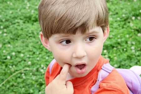 Funny face  Boy less four の写真素材