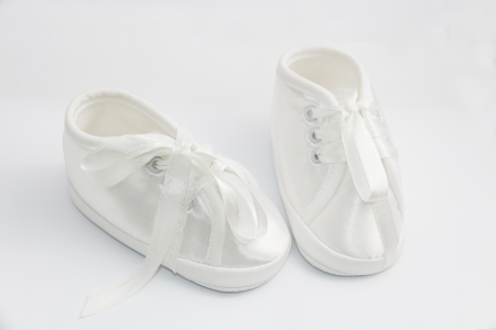 Little shoes for baptism infant の写真素材