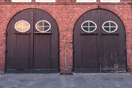 Old stylish door in building of fire brigade  Koszalin in Polandの写真素材