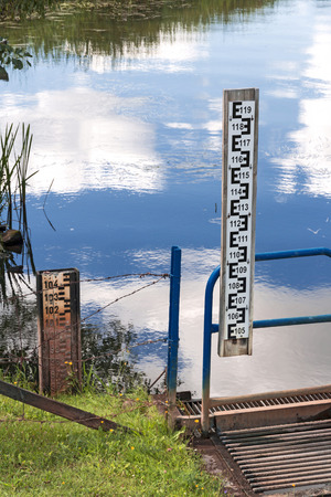 Measuring the depth of waterの写真素材