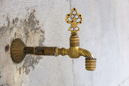 Tap in Blue Mosque for ritual ablution . Washing oneself is nessesery before Islam devotion.の写真素材