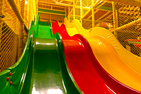 Modern playground with colorful slides.の写真素材