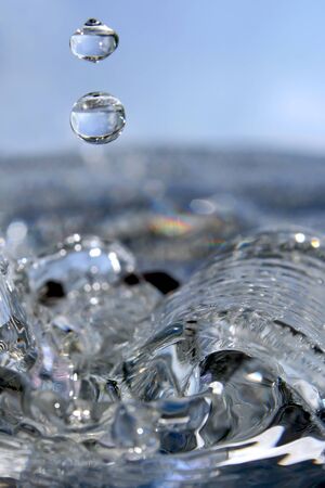 Here are the pure drops of water, the rest is the play with background and light.の写真素材