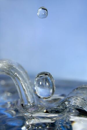 Here are the pure drops of water, the rest is the play with background and light.の写真素材