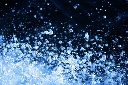 Water splashing to be used for a background on black