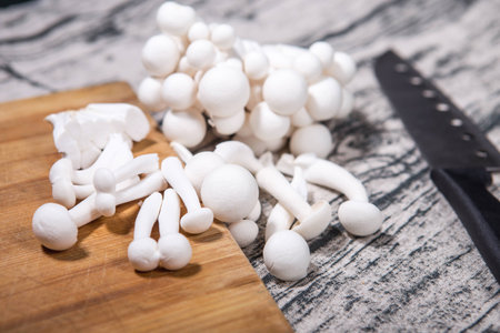 The white mushroom is on the tableの写真素材