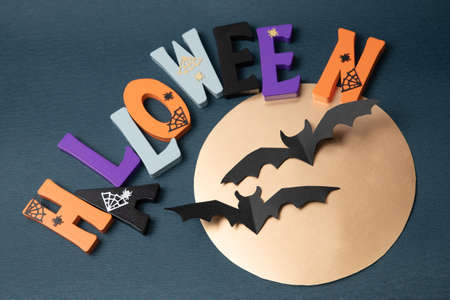 Happy Halloween wooden letters with pumpkins, spiders and other decorationsの写真素材