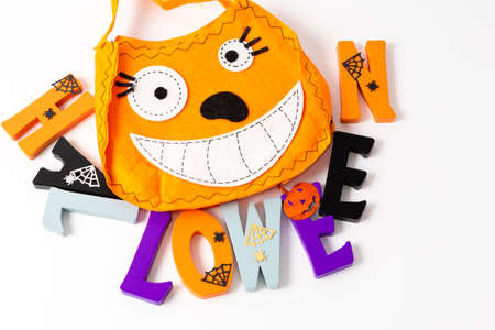 Happy Halloween wooden letters with pumpkins, spiders and other decorationsの写真素材