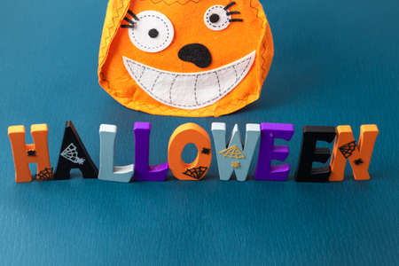 Happy Halloween wooden letters with pumpkins, spiders and other decorationsの写真素材
