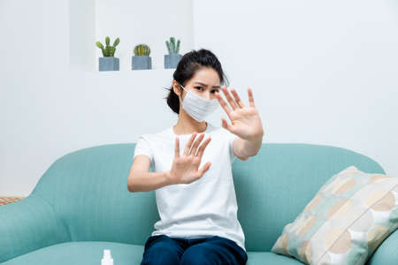 Asian woman getting sick and wearing face mask protection