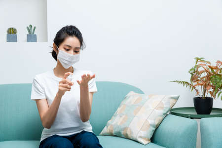 Asian woman getting sick and wearing face mask protection
