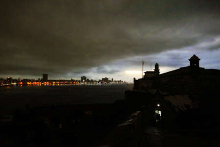 Darkness loomed over Havana bay and city, view from Casablancaのeditorial素材