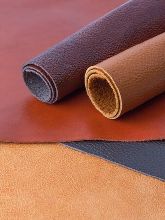 Different multicolored natural leather textures samplesの写真素材