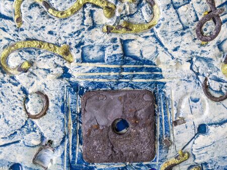 Natural blue ceramic texture background with metal objects in it