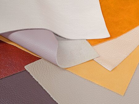 Different colors natural leather textures samples. Close-up shot 