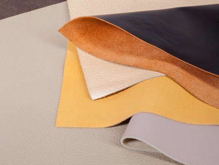 Different colors natural leather textures samples. Close-up shot