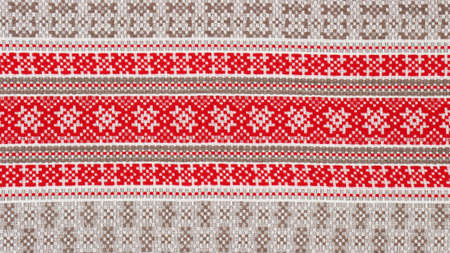 Textile texture in red, brown and white colors.の写真素材