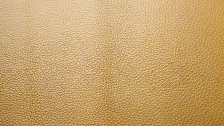 Genuine beige cattle leather texture background. Macro photo