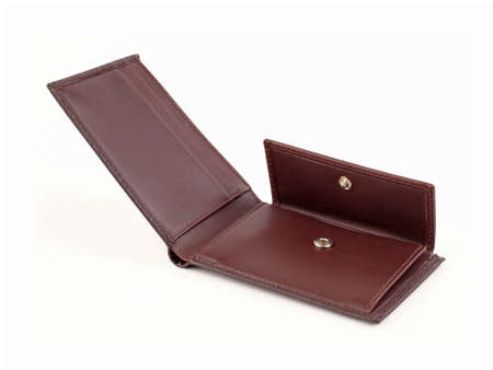 New brown open empty wallet of cattle leather. Isolated on white background. Close-up shot