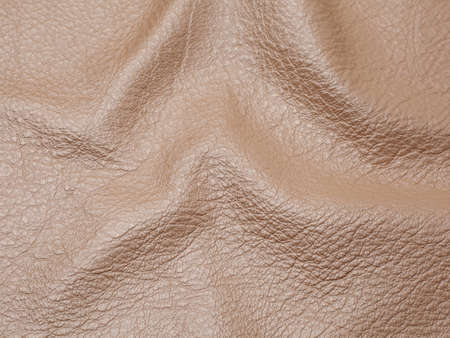Genuine beige cattle leather texture background. Macro photoの写真素材