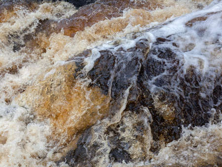 Troubled water stream background and pattern. River. Top viewの写真素材